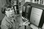 Martha McClure Ezell Operates MicroBook Machine