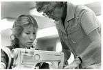 Edith Reynolds Helps Student with Stitching