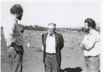 Dick Ponzi and Dick Erath Speaking to an Unidentified Man