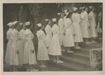 Nursing Graduates Outside Church 01 by Unknown