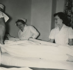Nurses Working in Surgery by Unknown