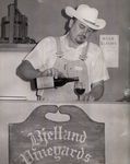 Paul Bjelland Pouring Wine at a Tasting by Unknown